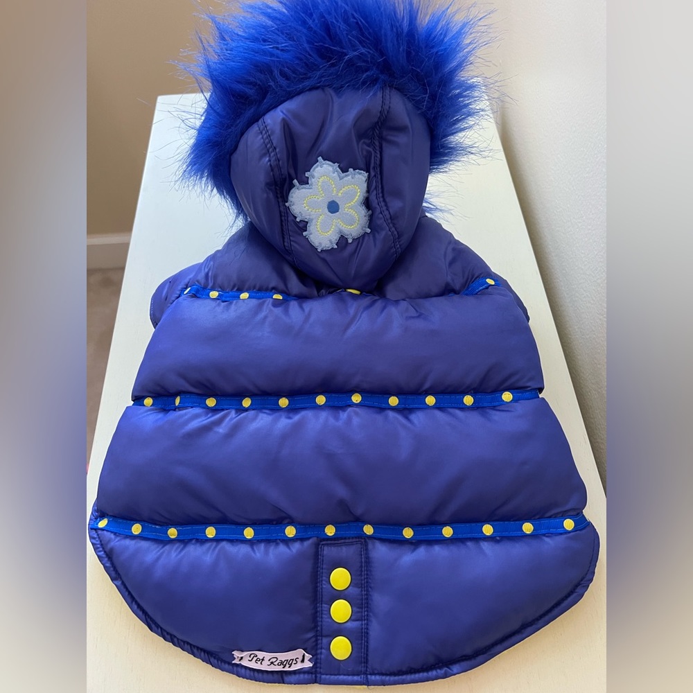 Quilted Coat with lots of thickness for warmth and fur trimmed hood.